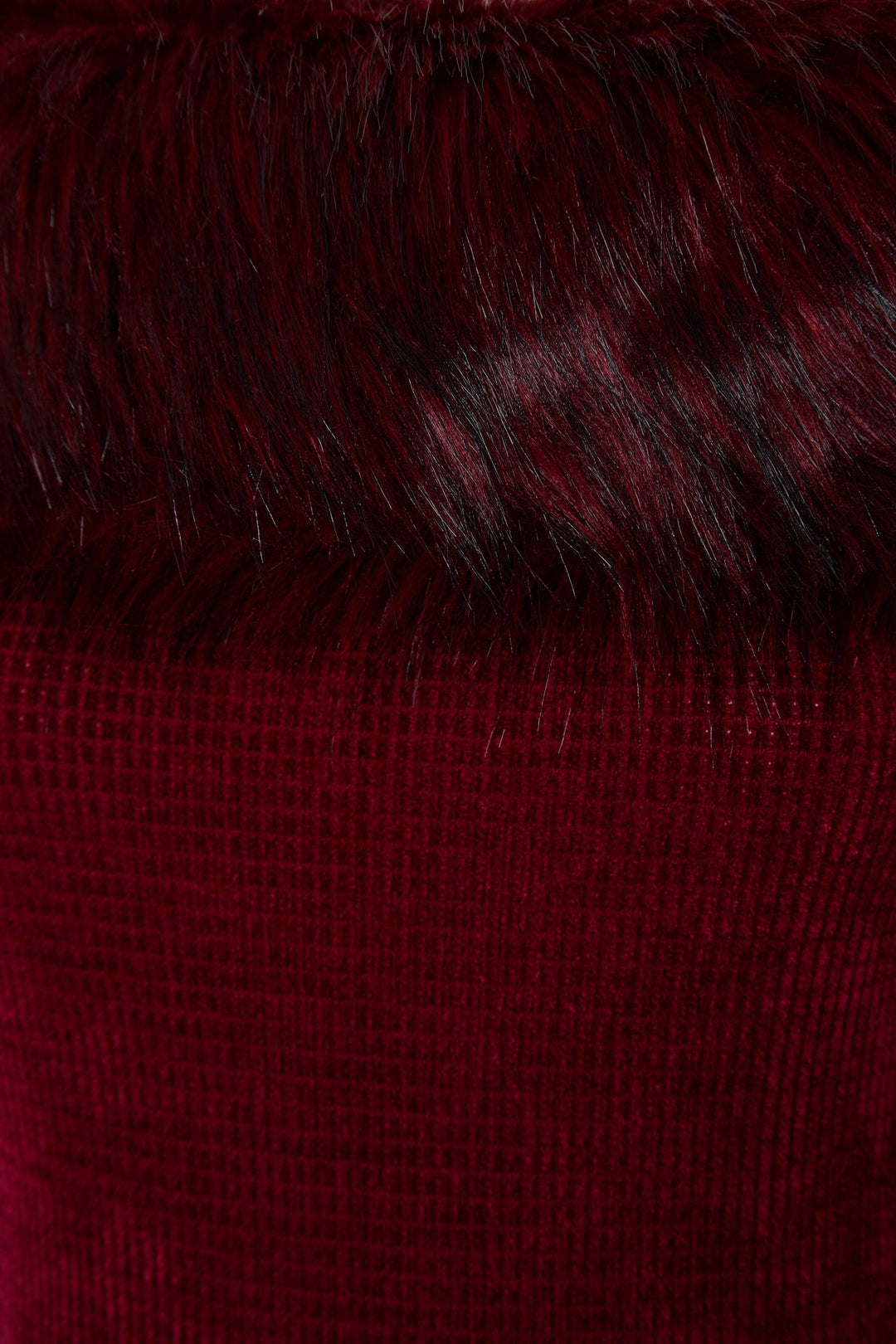 Knit jumpsuit with faux fur trim