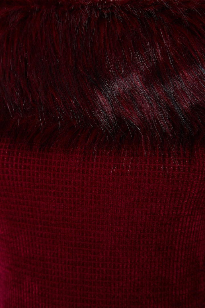 Knit jumpsuit with faux fur trim