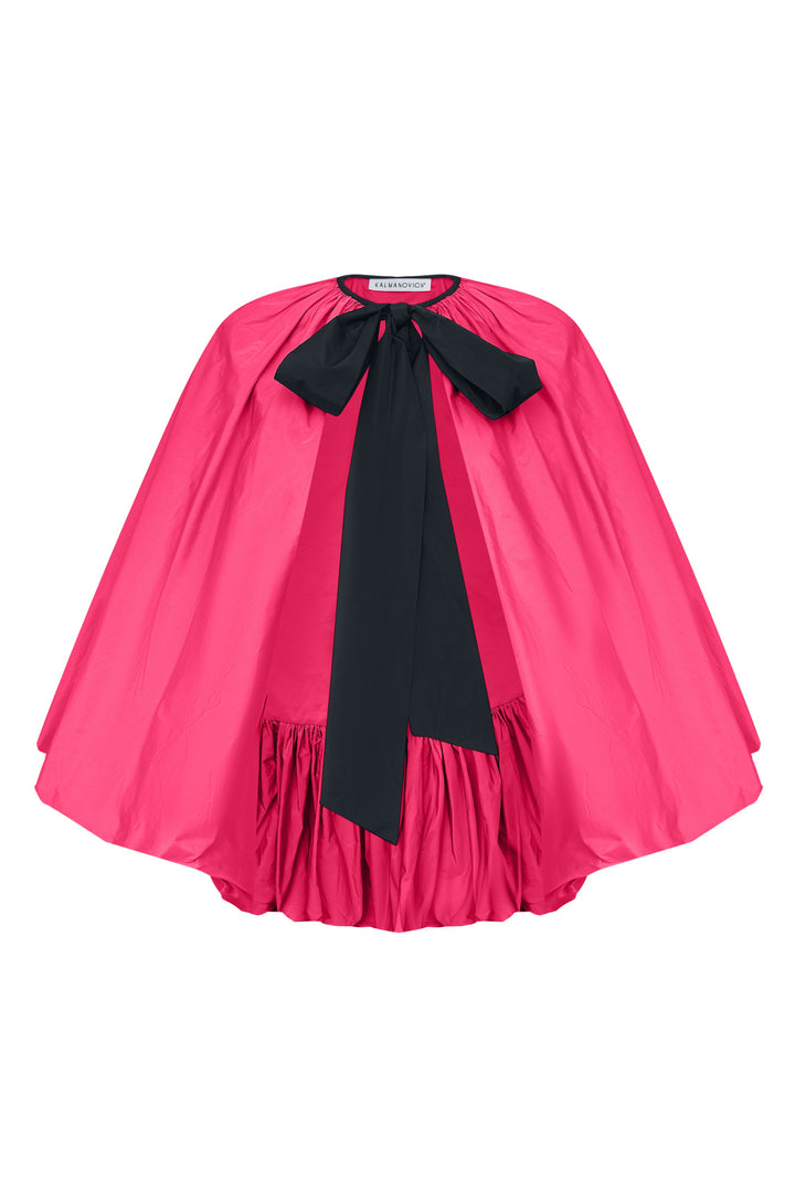 Cape with a contrast bow