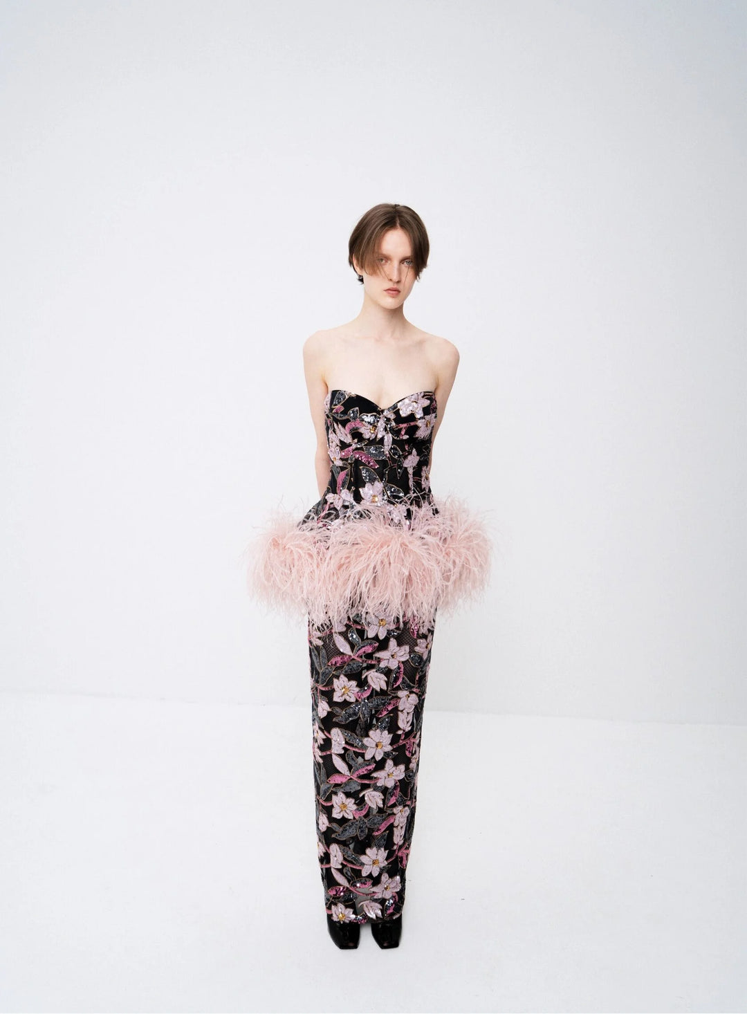 Sequin-embellished bustier dress with an ostrich feather peplum