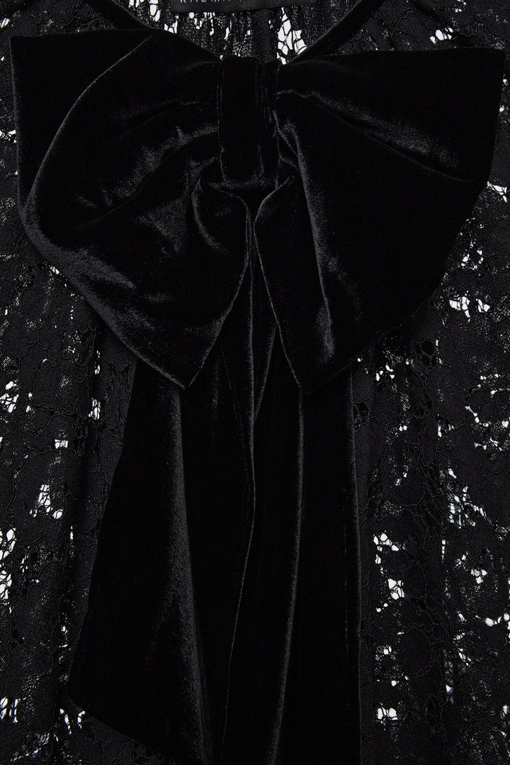 Cord lace cape with decorative bow