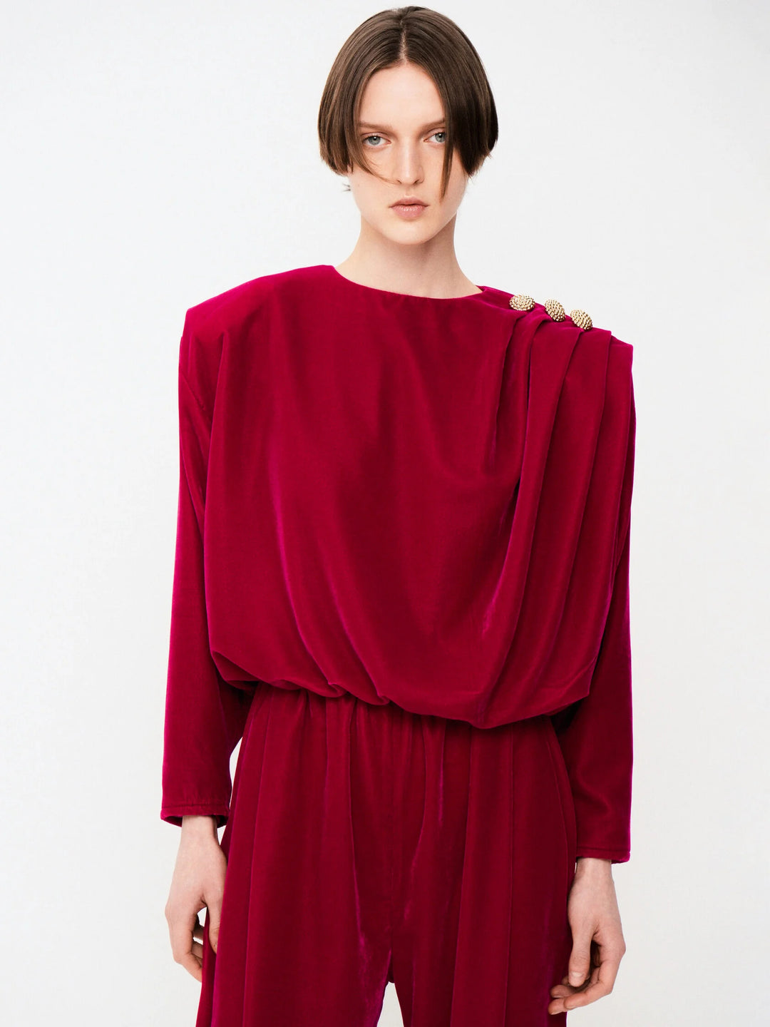 Velvet jumpsuit with shoulder draping