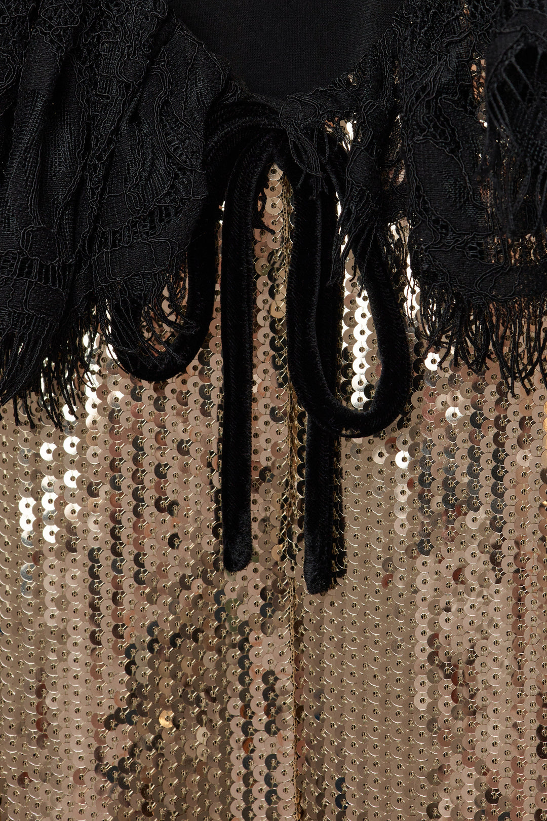 Sequinned dress with a lace collar