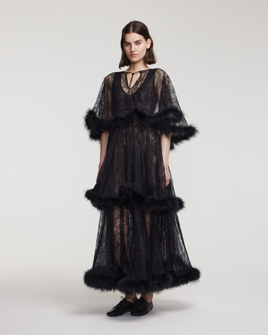 Lace dress with marabou feather trim