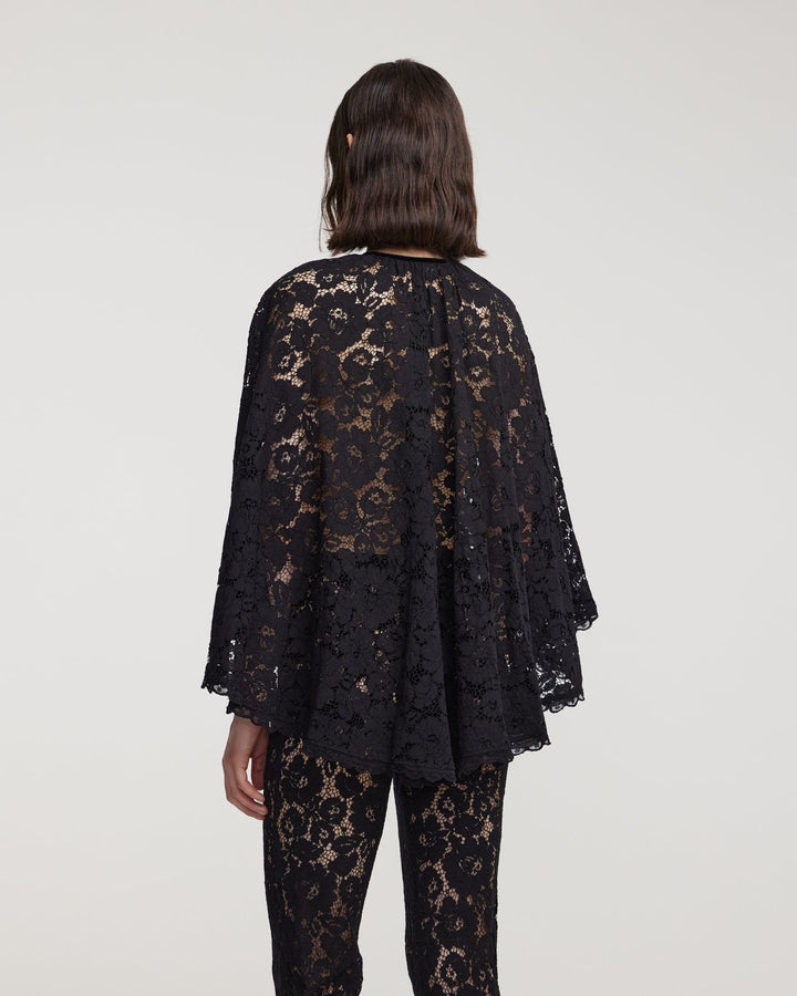 Cord lace cape with decorative bow