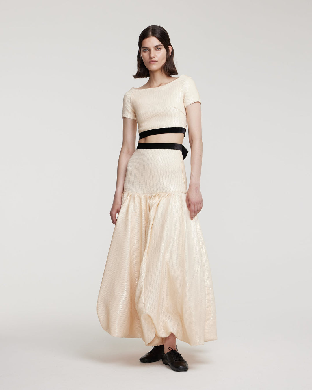 Sequin top with decorative bow