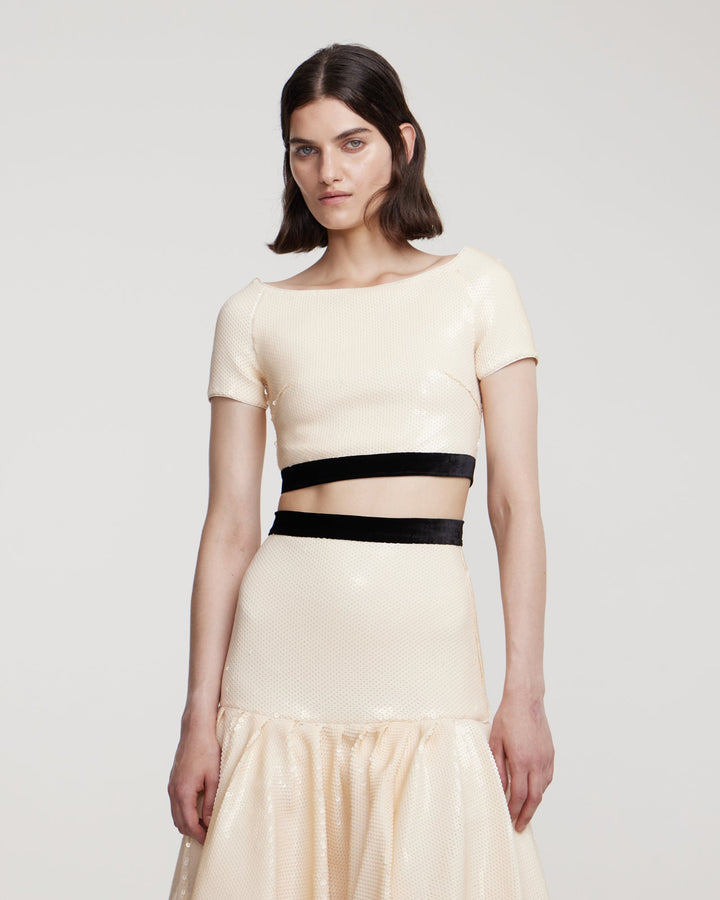 Sequin top with decorative bow