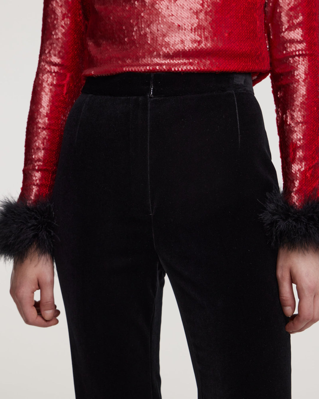 Trousers with marabou feather trim