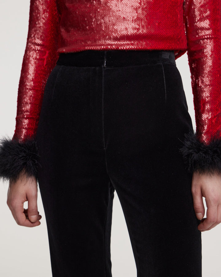 Trousers with marabou feather trim