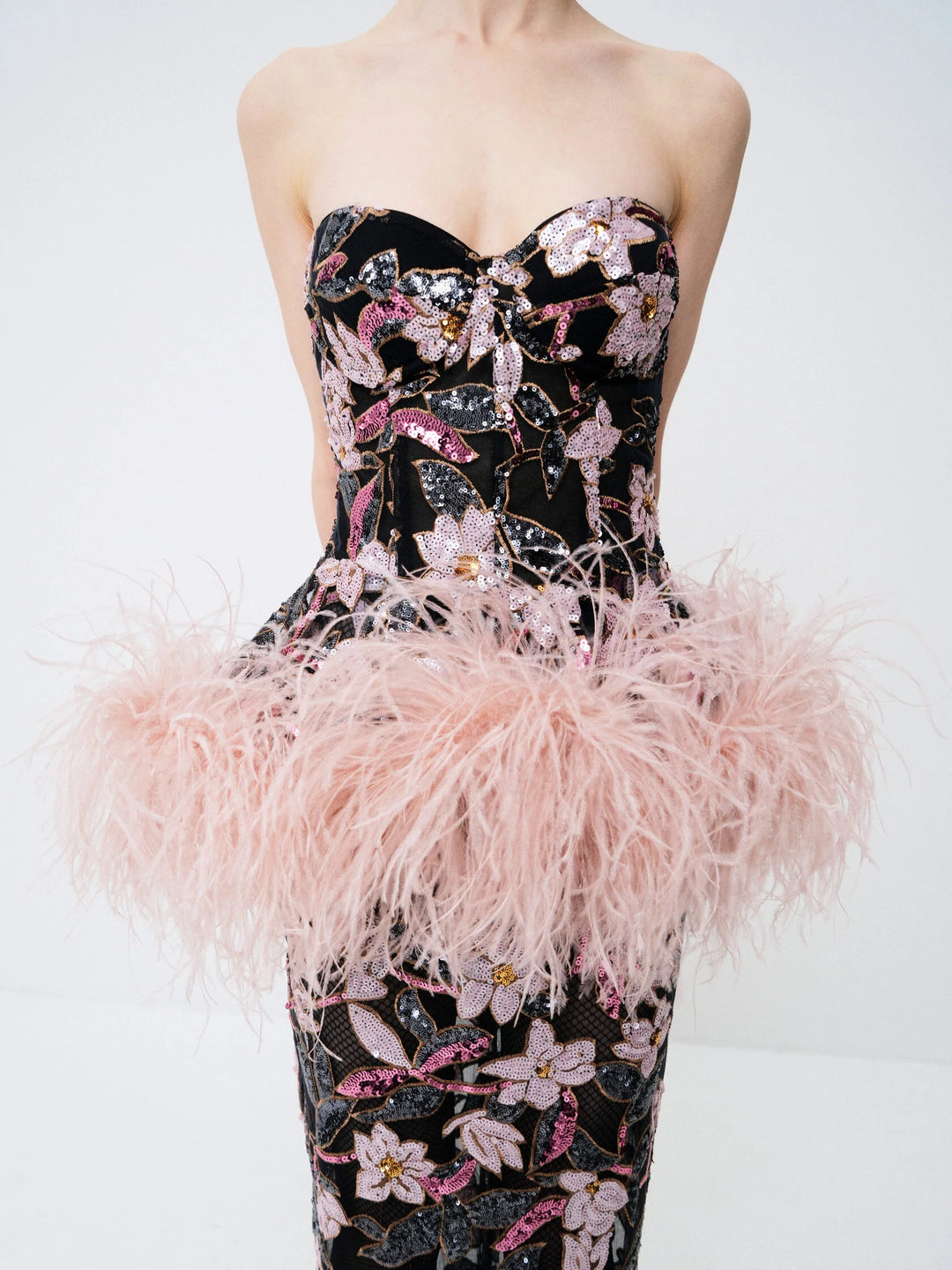 Sequin-embellished bustier dress with an ostrich feather peplum
