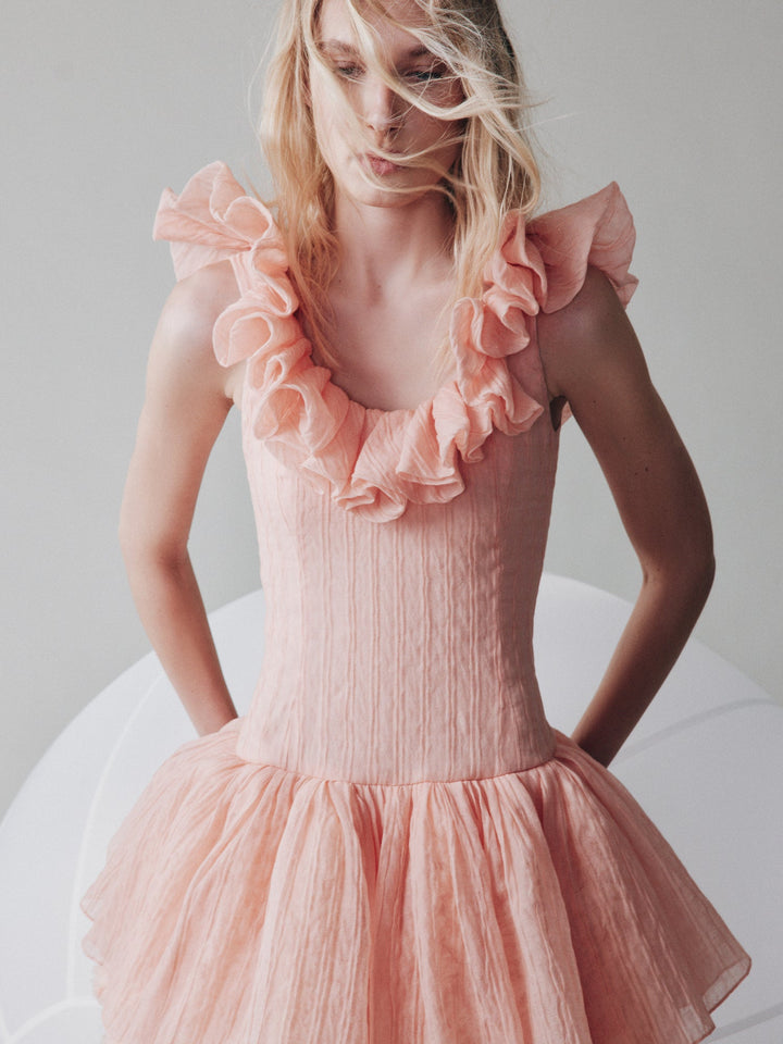 Mini dress with a voluminous skirt