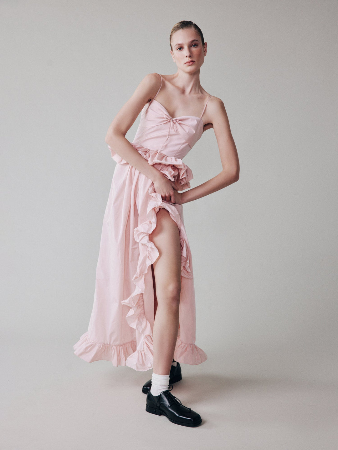 Taffeta slip dress with a ruffled slit